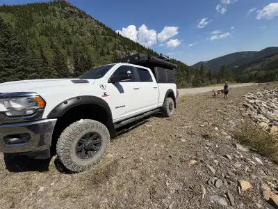 2021 Ram 2500 6.7L Cummins Diesel, Big Horn, Alu-Cab canopy and rooftop tent. 35”x 12.5 Duratrac Wra...