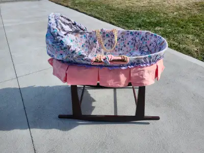 Wooden rocking bassinet stand Bassinet basket with hood and carrying handles Fabric can be removed a...