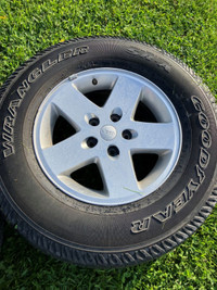 2011 Jeep Wrangler Tires and Rims. Rims are like New condition