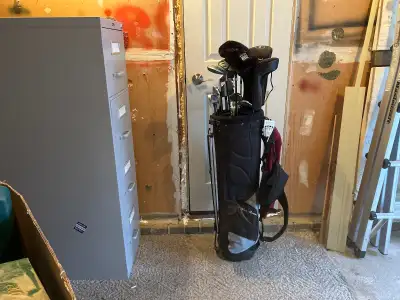 Golf bag and clubs.