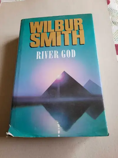 Dive into the ancient world with this captivating hardcover edition of Wilbur Smith's 'River God,' a...