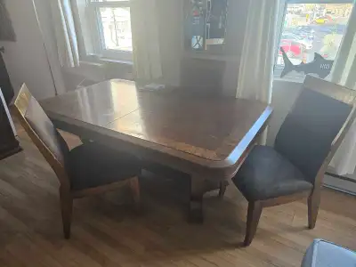 Beautiful Ashley Furniture dining table and Hutch. 7/10 , View more