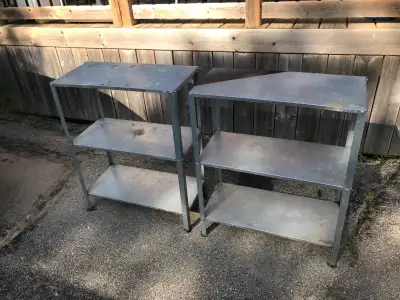 This is an ad for a lot of two pre-owned assembled Ikea HYLLIS metal indoor / outdoor shelving units...