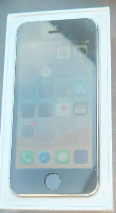 Unlocked, has some scrathes, comes with box, delivery for a fee