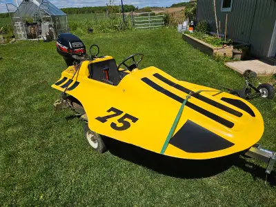 1999 Homemade Mini boat 8' fibreglass mini boat. Boat is in good shape and cones with a trailer. Boa...