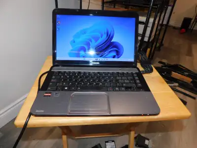 Toshiba Satellite L840D 14" Quad CORE AMD A8 640GB 8GB NEW Batt, View more