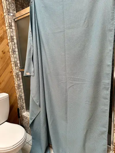 Washed and ready for you 1 year old blue/teal shower curtain with rings (Rings have never been used)...