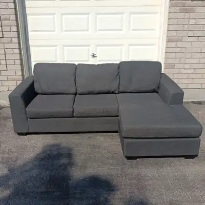 This comfy grey sectional sofa is good shape! ** If this ad is up, the couch is available** A few si...