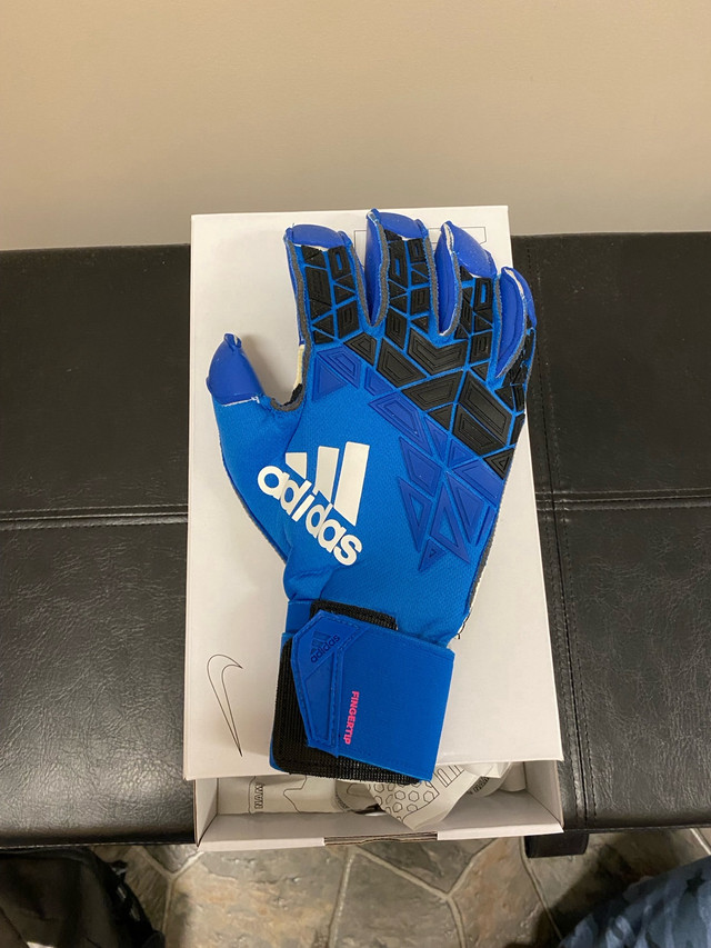 blue and white adidas soccer goalie gloves in Soccer in Winnipeg