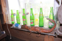Variety of vintage soda pop and beer bottles
