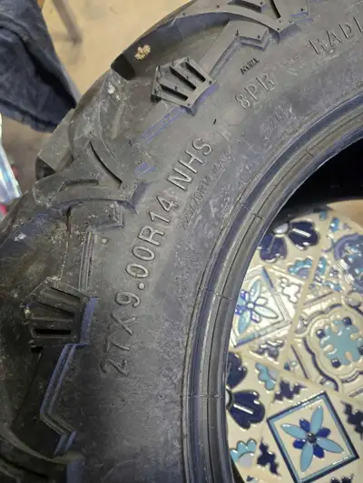 27x9x14 fronts 27x11x14 rears only1500km on them excellent condition asking $550 obo Text 403 376 60...