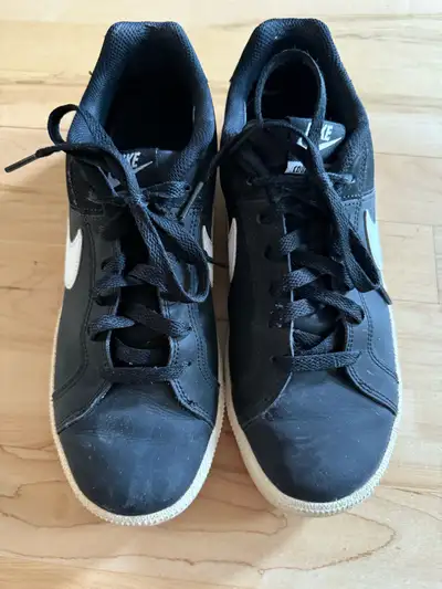 Women’s Nike Court Legacy Sneakers in size 9. These shoes have been worn and the soles have slightly...