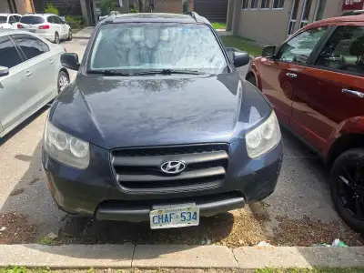 2009 HYUNDAI SANTA FE RUNS AND DRIVES. Engine light is on, no other light is on. Good for parts and...