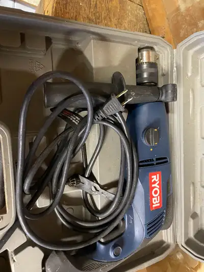 Ryobi hammer drill and case for sale