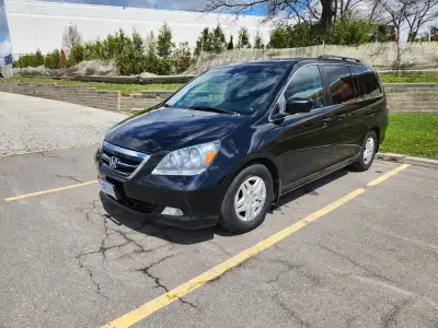 Hello! I have for sale our 2008 Honda Odyssey - Touring Model - with ***240,000km***. ***Clean Title...