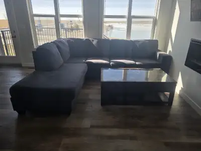Ashley brand Good condition Sofa set with coffee table for sale., View more