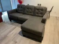 Sectional grey fabric Sofa in good condition