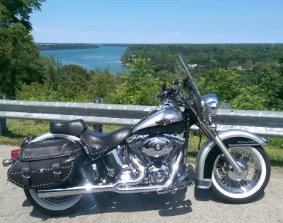 2003 Harley Davidson 100th anniversary heritage softail, silver and black with 69klms. Many custom p...