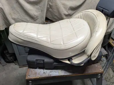 I have two Harley Buddy seats. $250 each One has the bracket and springs. The other has a T-Bar.