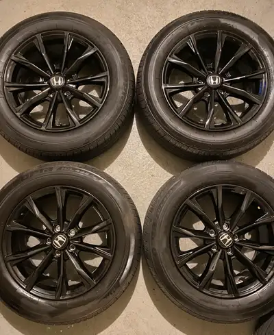 Selling a clean set of OEM 18” black Honda rims with Bridgestone Ecopia H/L 422 Plus all-season tire...