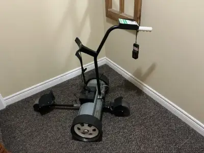 Lectronic Caddy. Remote control for carrying your Golf clubs, so you don't have to. Lightly used in...