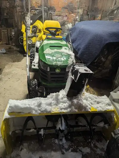 For sale is my John Deere S220 riding lawn mower, a reliable machine with a 44" snowblower attachmen...