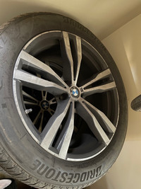 BMW X7 OEM rims and tires 21” 