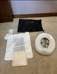 Travel potty with liners and bag