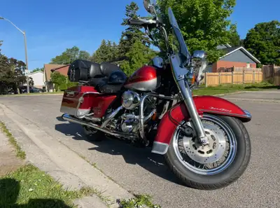 Get ready to cruise with this classic 1999 Harley-Davidson FLHR Road King, a touring motorcycle know...