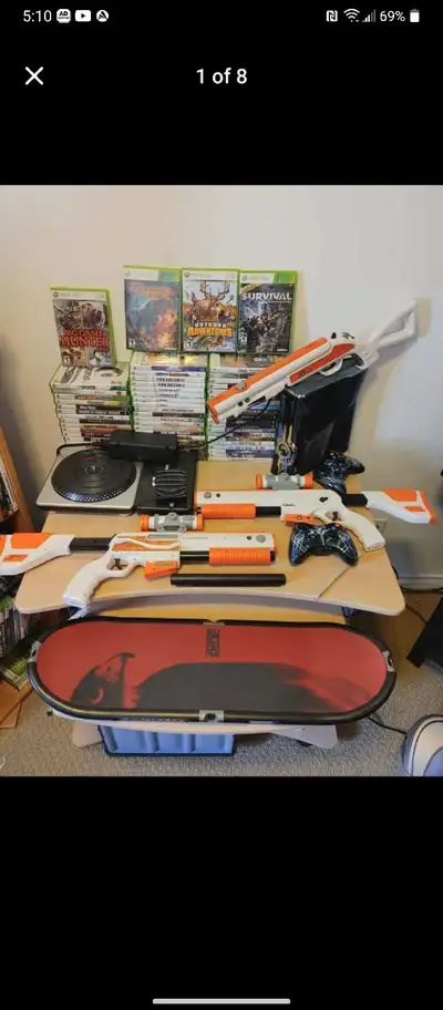 Xbox 360 Limited Edition Halo 4 plus 60 games and accessories, View more