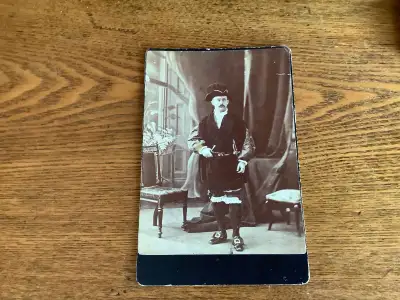 Antique photograph card of a performer/actor in costume. Circa 19th century or early 20th century. P...
