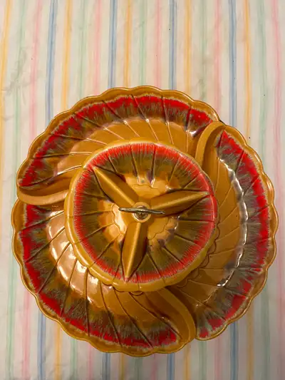 This mid-century serving dish sits on a revolving wood turntable 3 oval dishes stack for easy storag...