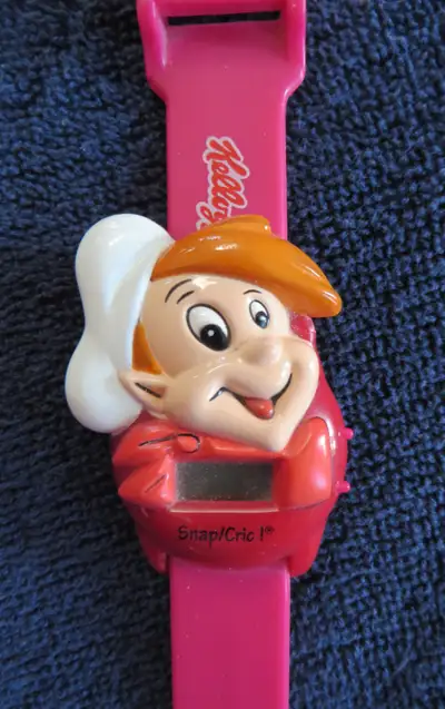 1990’s. Snap. Cereal toy watch. Advertising toy. Digital watch. A hot pink working watch with new ba...
