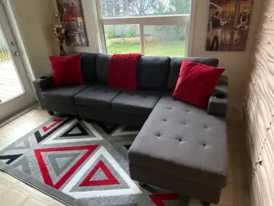 Reversible grey sectional couch in like new condition, View more