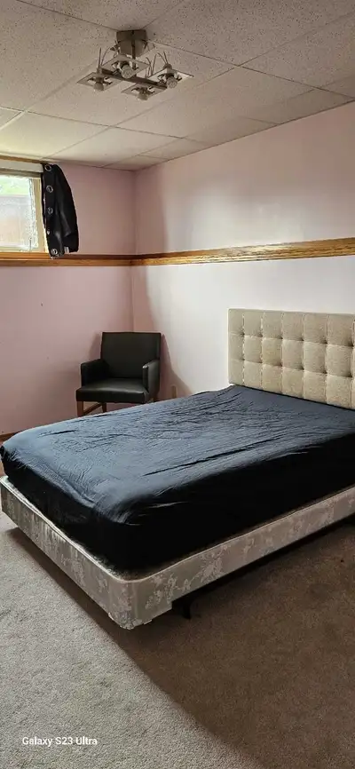 Hi, Spacious single bedroom for rent in a clean and quiet house on basement, with shared kitchen and...