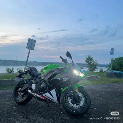 Experience the thrill of the open road on this stunning 2022 Kawasaki Ninja 650, which has been meti...