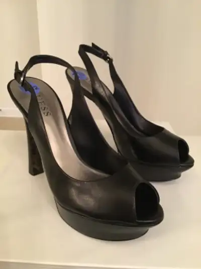 Fabulous GUESS black platform heels  7 1/2, View more