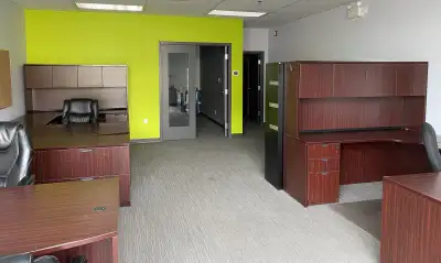 Furnished Office Space for Lease: - Open Office Concept with (3) Desk Workstations - Boardroom with...