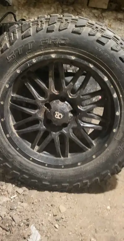 These are used Revenge Off-Road rims with Cooper Discoverer STT Pro tires, size LT275/65R20, fit for...