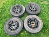 195/65/15 all season tires on 15x6 steel wheels. 5x105 bolt patt