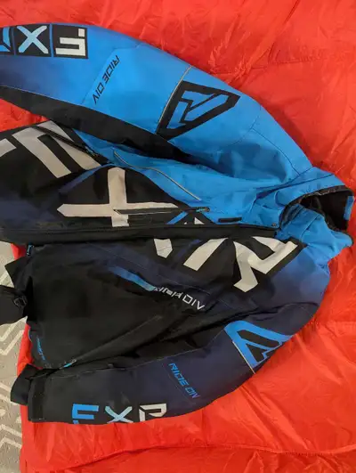 2XL FXR snowmobile coat. In great condition, barley used. No rips and all zippers work.