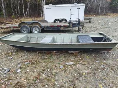 14 foot John boat has a livewell in the 1 seat and is in good shape no leaks $1200 or trade