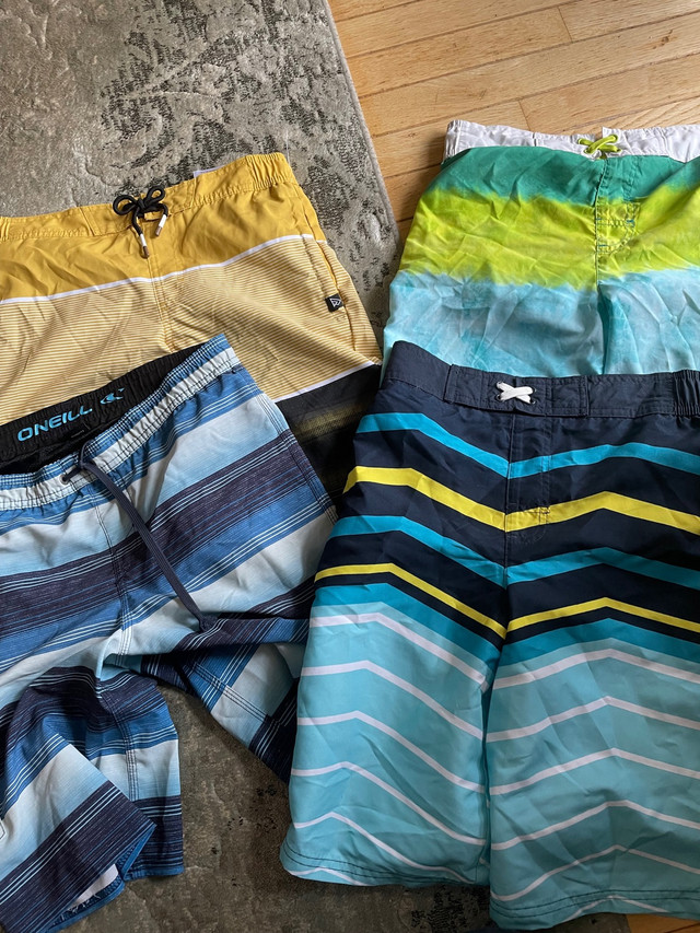  Boys swim shorts and shirts size 14-16 and men’s small in Kids & Youth in Kitchener / Waterloo
