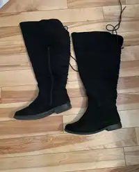 Black long suede boots. Used good!