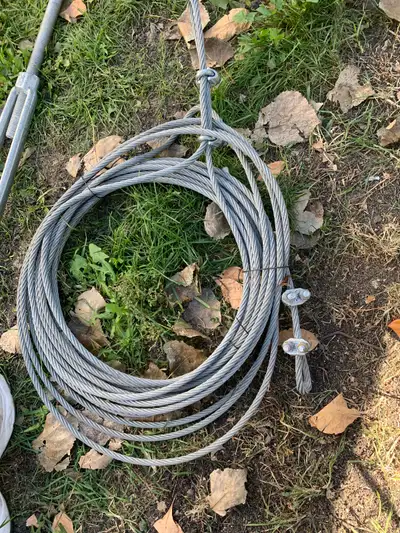 Heavy duty turnbuckle and cable about 50-60 feet - - text or call please and thanks 204-396-2979 ! T...
