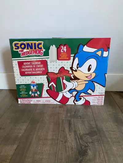 This is a Sonic the Hedgehog advent calendar with 24 surprises inside. It includes holiday-themed fi...