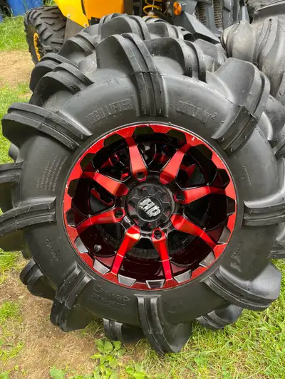 30 inch outlaw 2 tires 14 inch sti HD alloy wheels Polaris bolt pattern(4x156)can am adapters(4x137)...