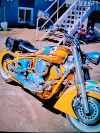 2001 yamaha fully customized.  And sporster 1200