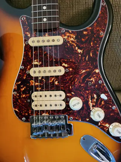 1997 Fender Mexican Squier. In very good shape and presents well. Vintage frets. Guitar has new tune...