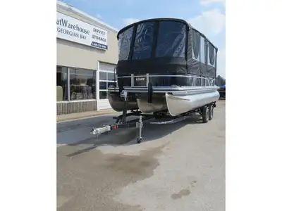 21 Foot Tritoon with performance package, double bimini top and FULL Enclosure! Includes lifting str...